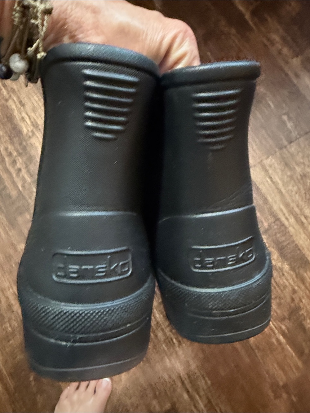 Women’s Dansko Black Waterproof Slip-On Rain Boots